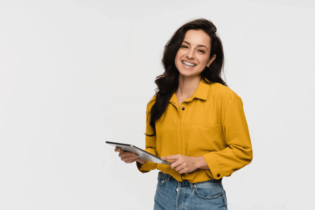Smiling woman with tech